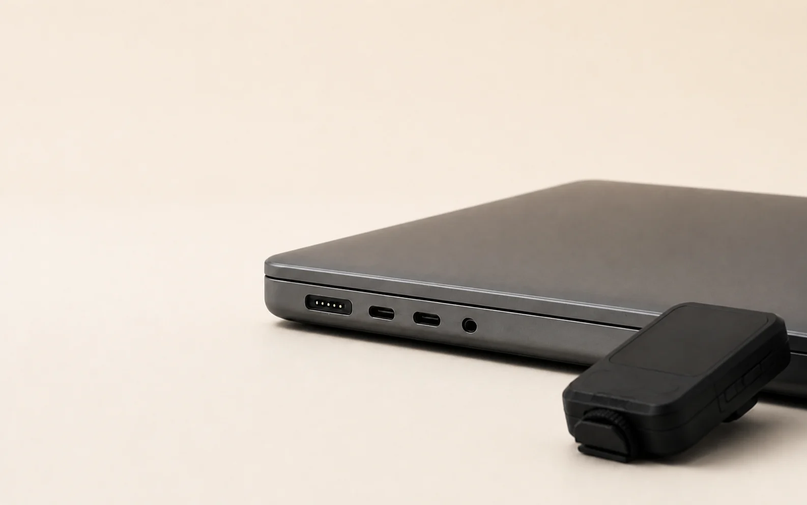 A laptop and generic trigger set apart on a studio table, visually representing a local workflow